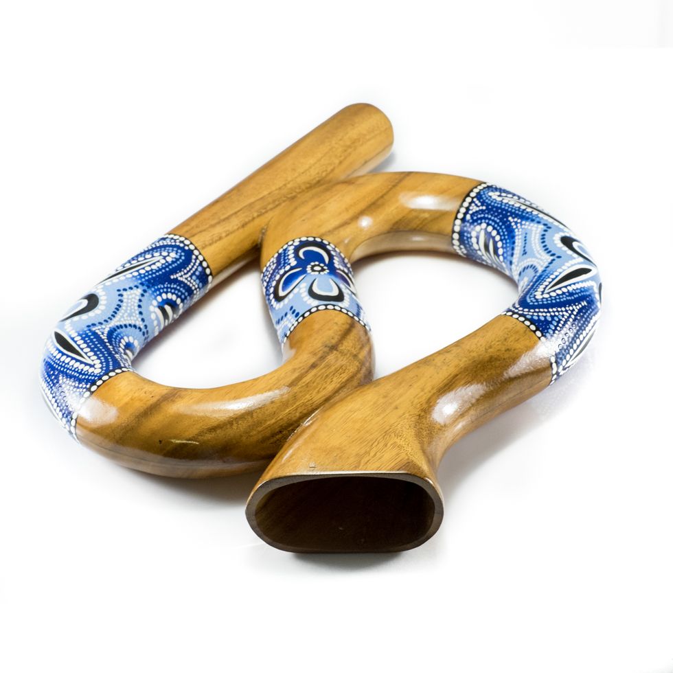 Serpentine shaped travel didgeridoo in blue colour